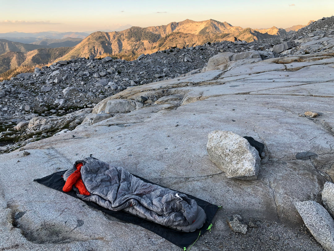 Brendan McCullough setting up his campsite in the mountains