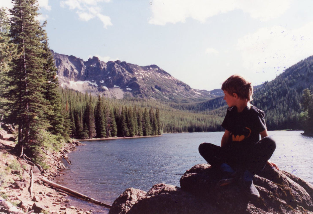 Brendan McCullough as a child overlooking a lake